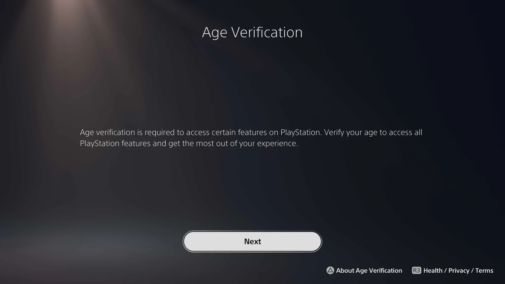 A black and grey PlayStation prompt screen with text explaining age verification.