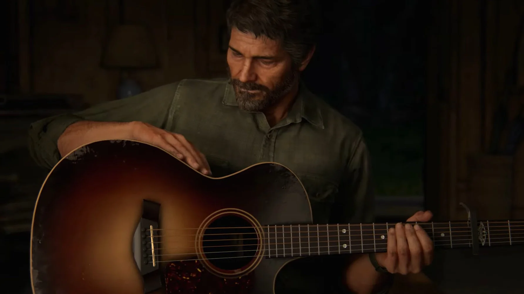 Joel sostiene su guitarra en TLOU2